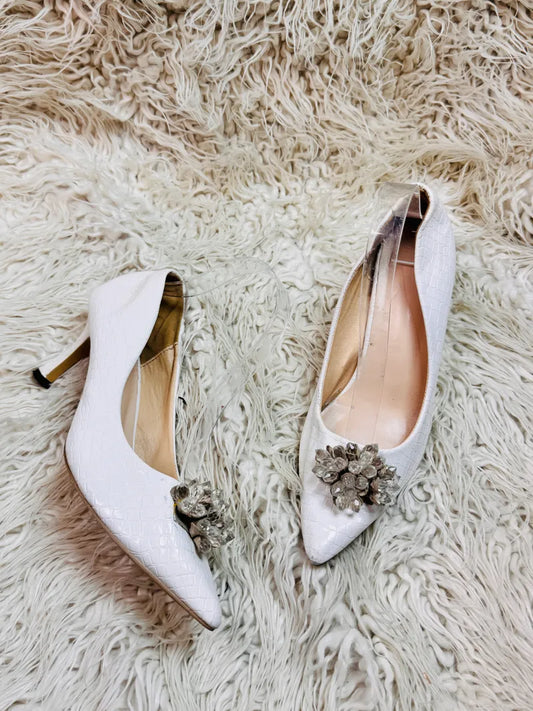 White heel pumps