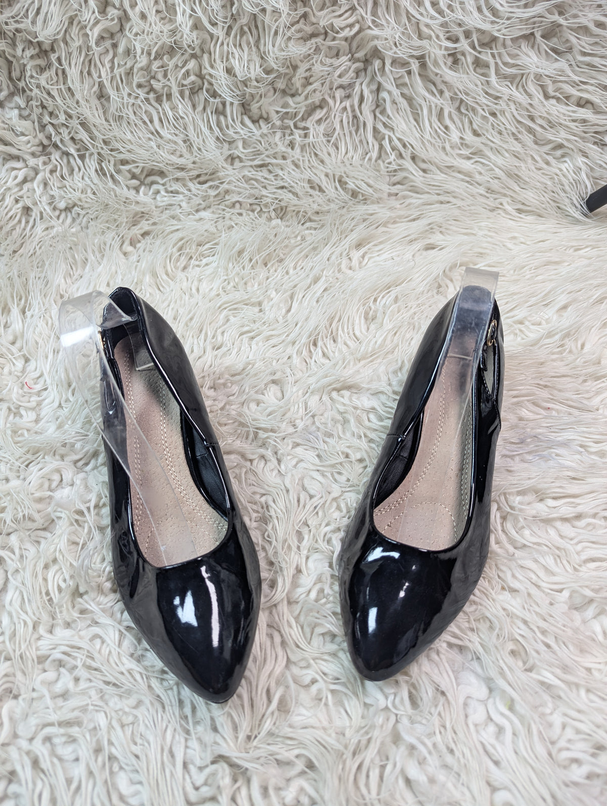 A short Black Shiney Short heel