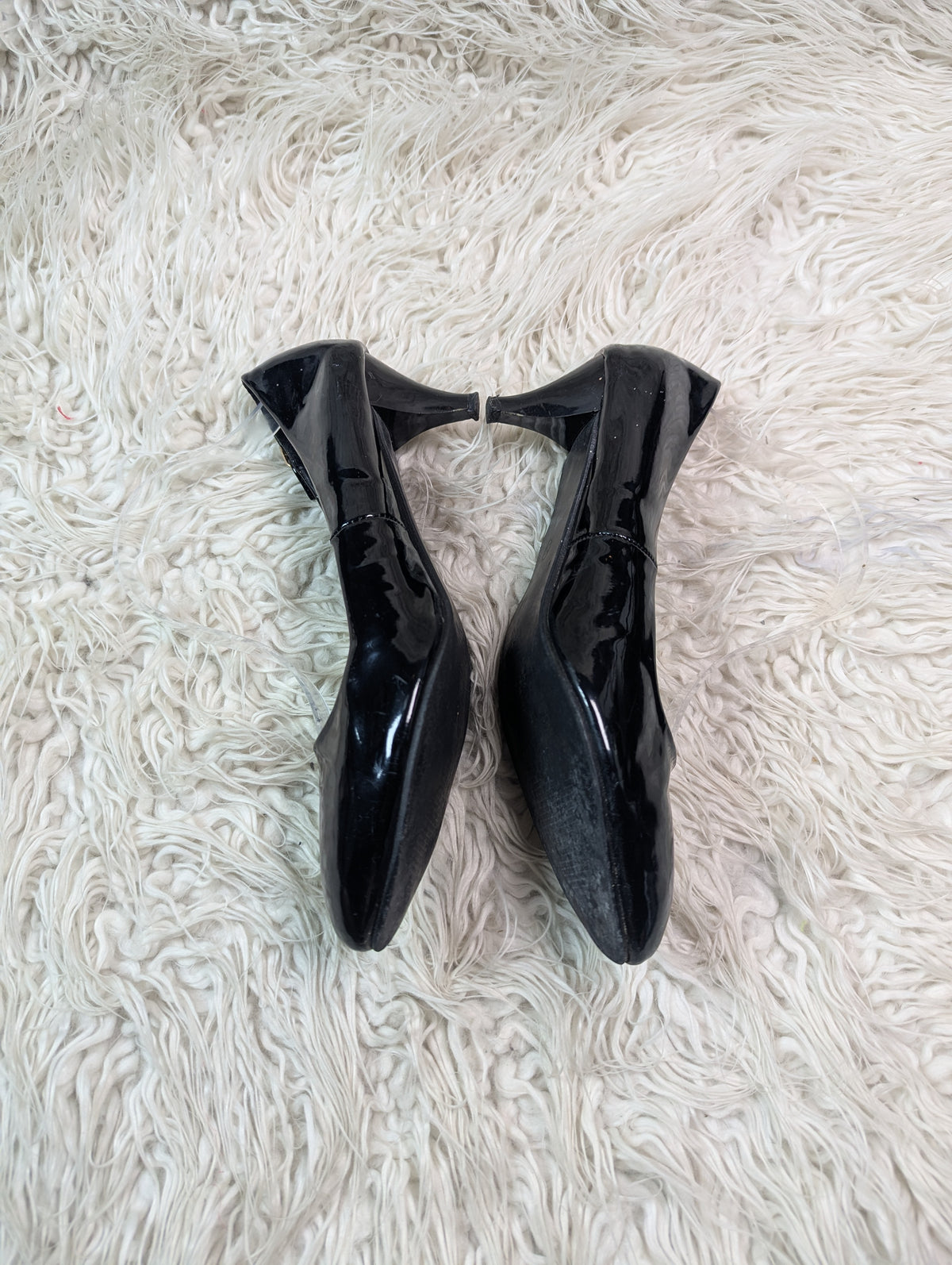 A short Black Shiney Short heel