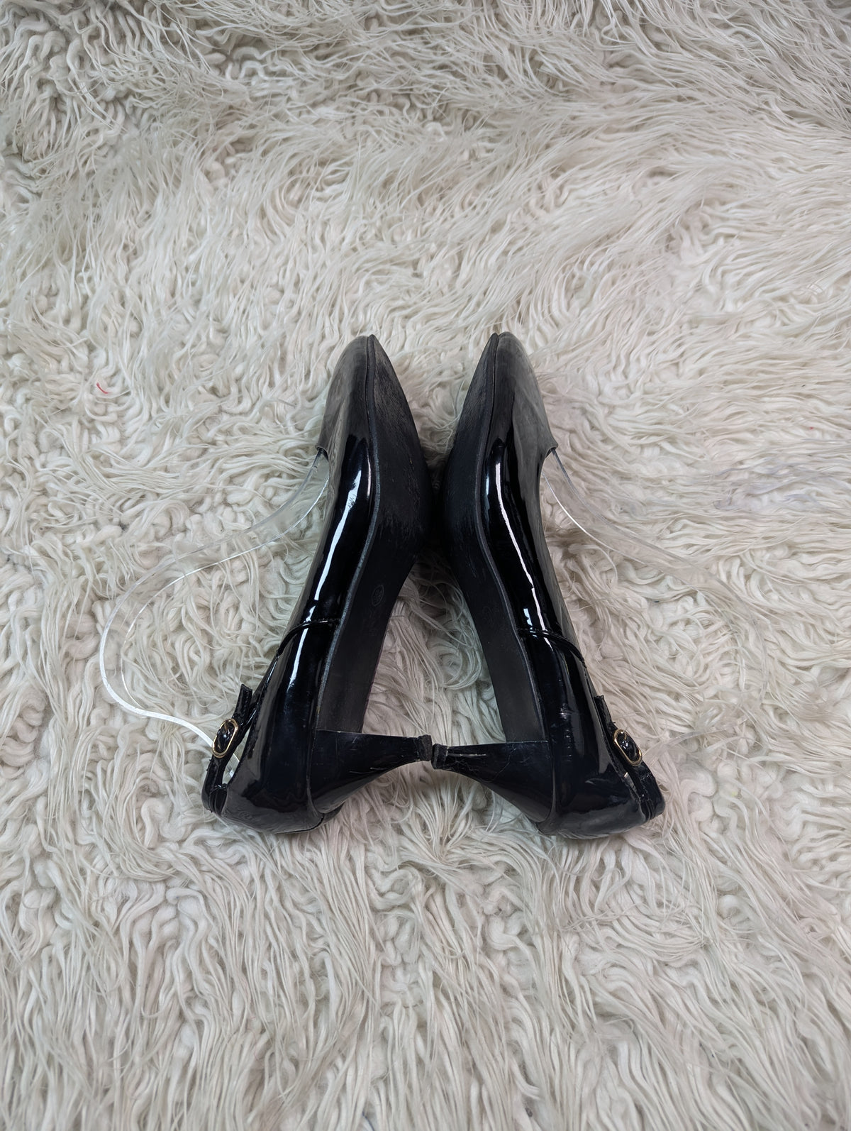 A short Black Shiney Short heel
