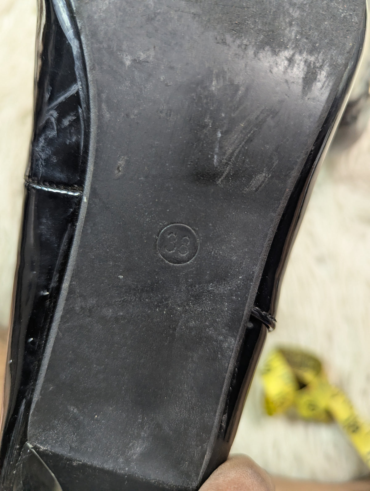 A short Black Shiney Short heel