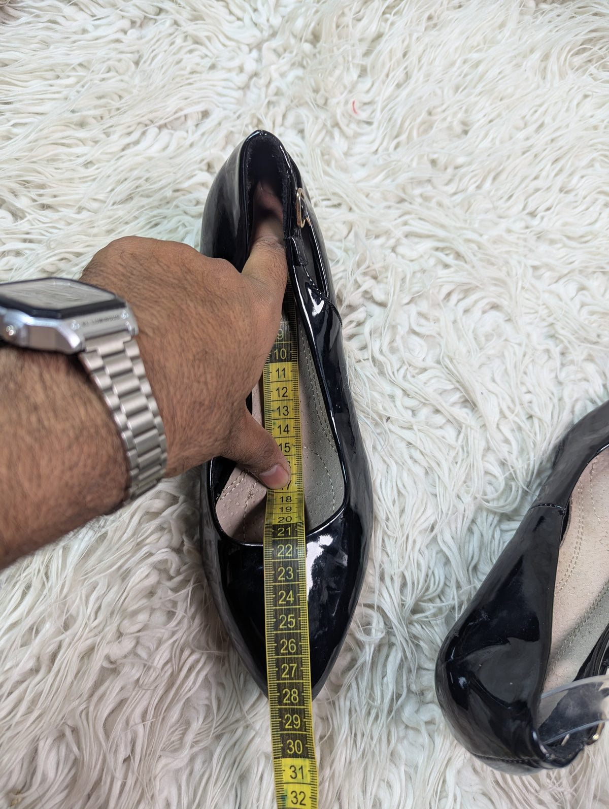 A short Black Shiney Short heel