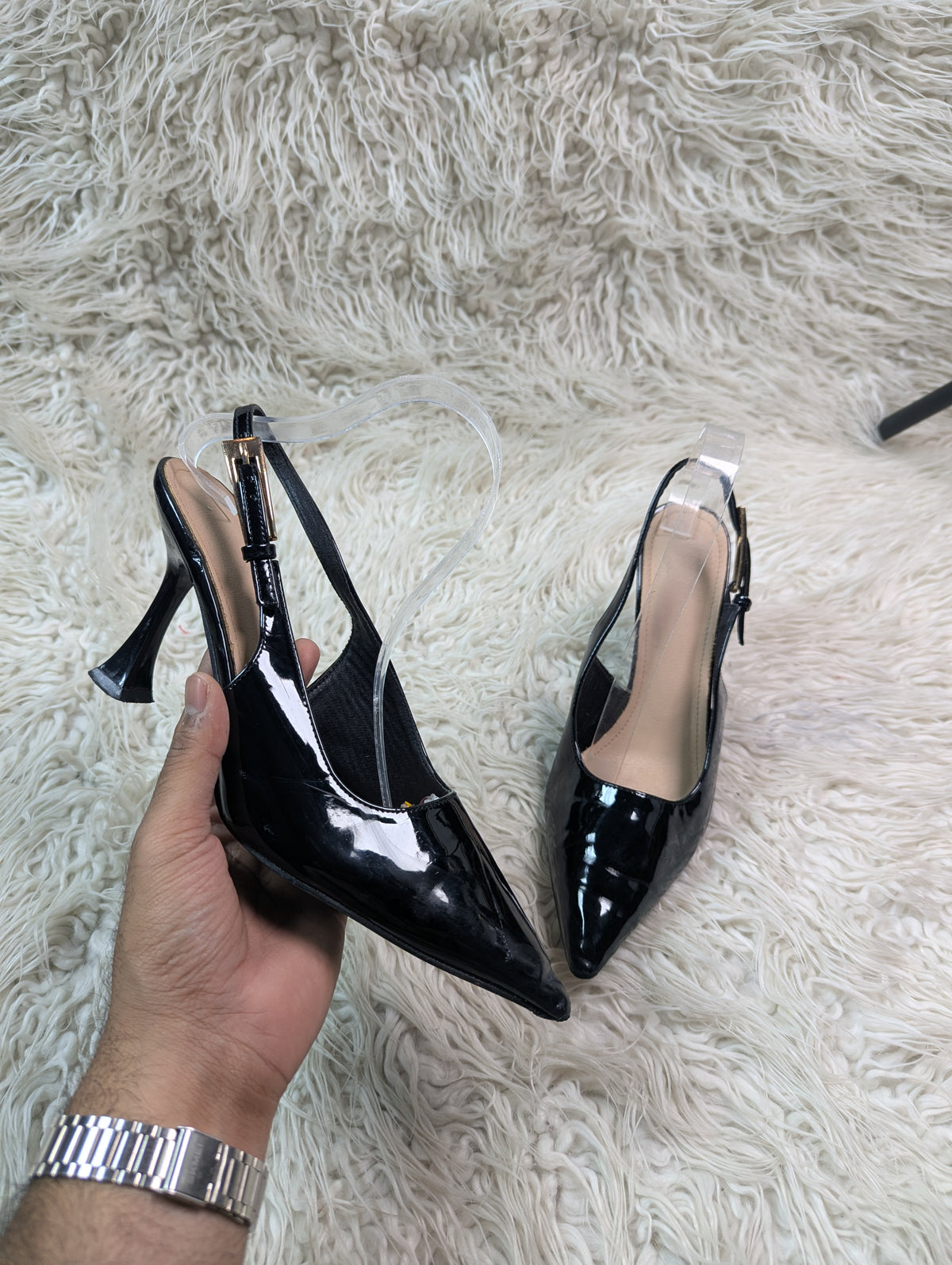 Shiny black heel