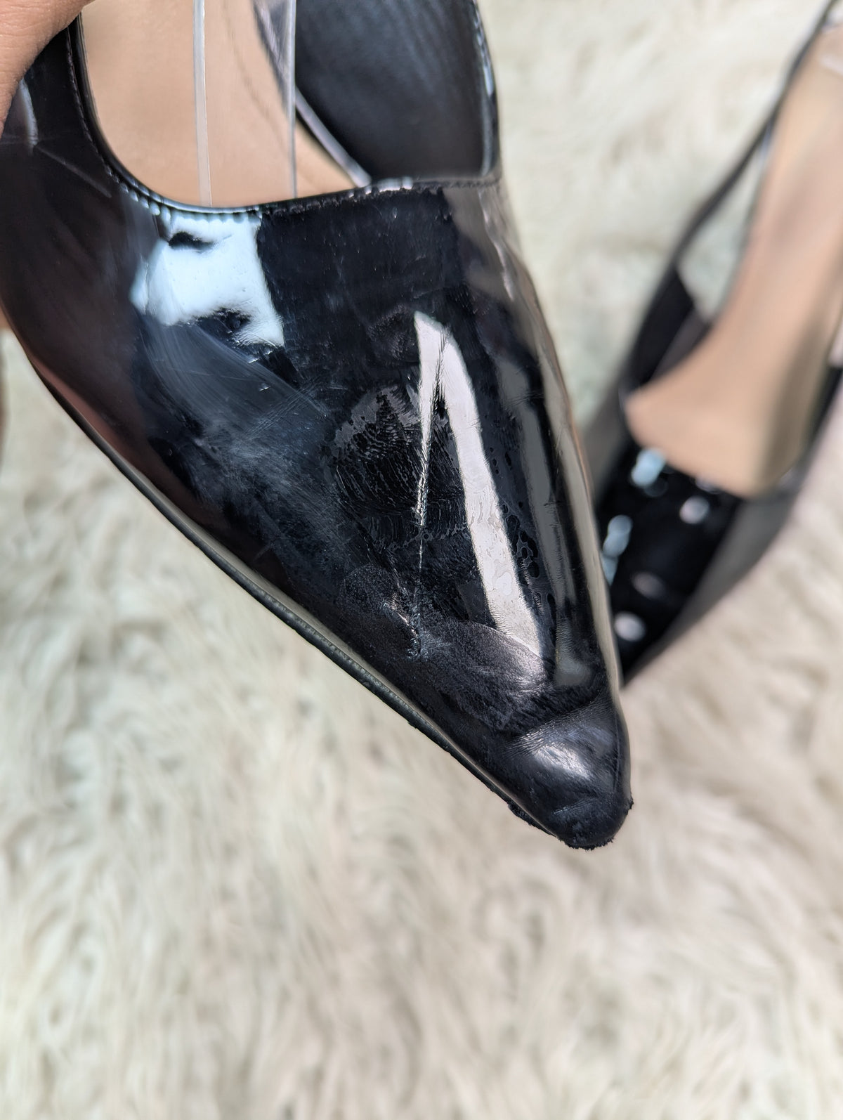 Shiny black heel