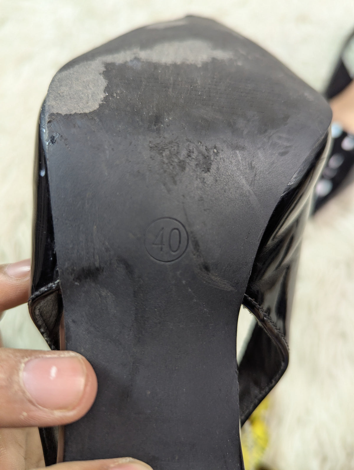 Shiny black heel