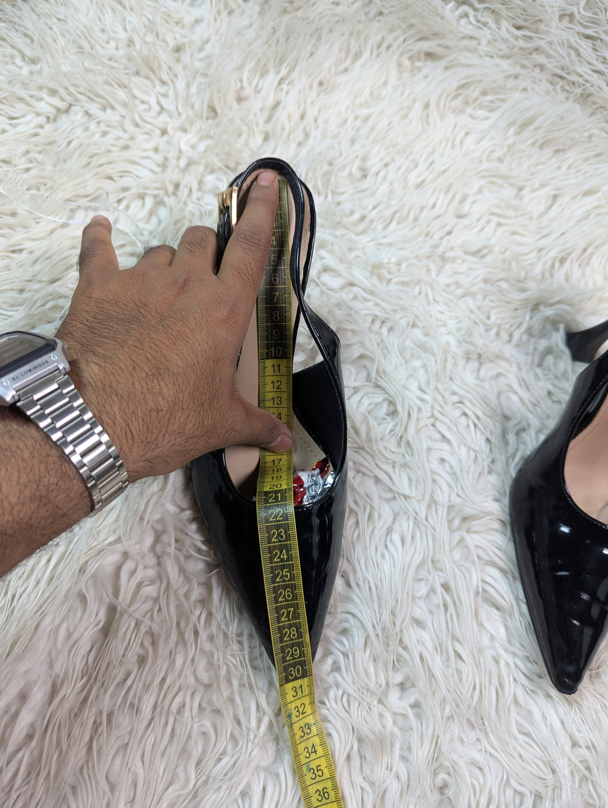 Shiny black heel