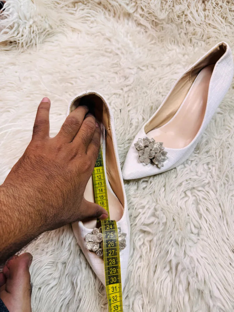 White heel pumps