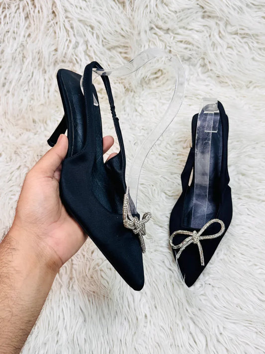 Black pencil heel pumps