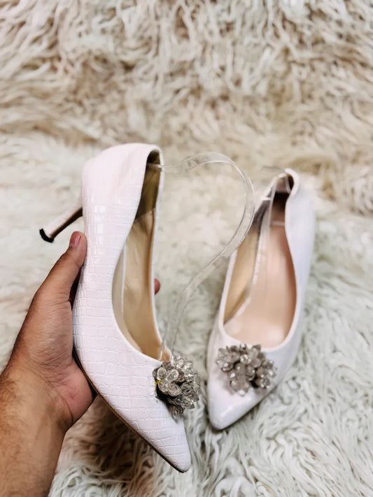 White heel pumps