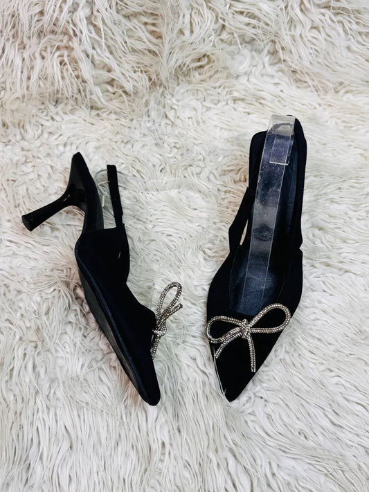 Black pencil heel pumps