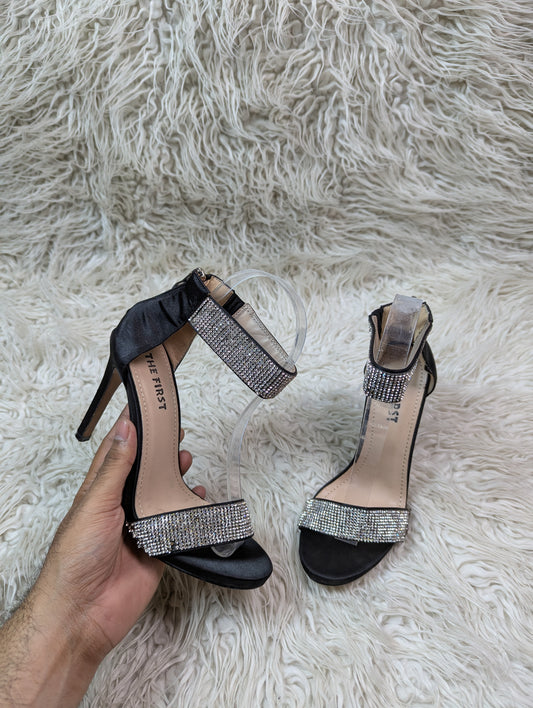 The first Black pencil heel