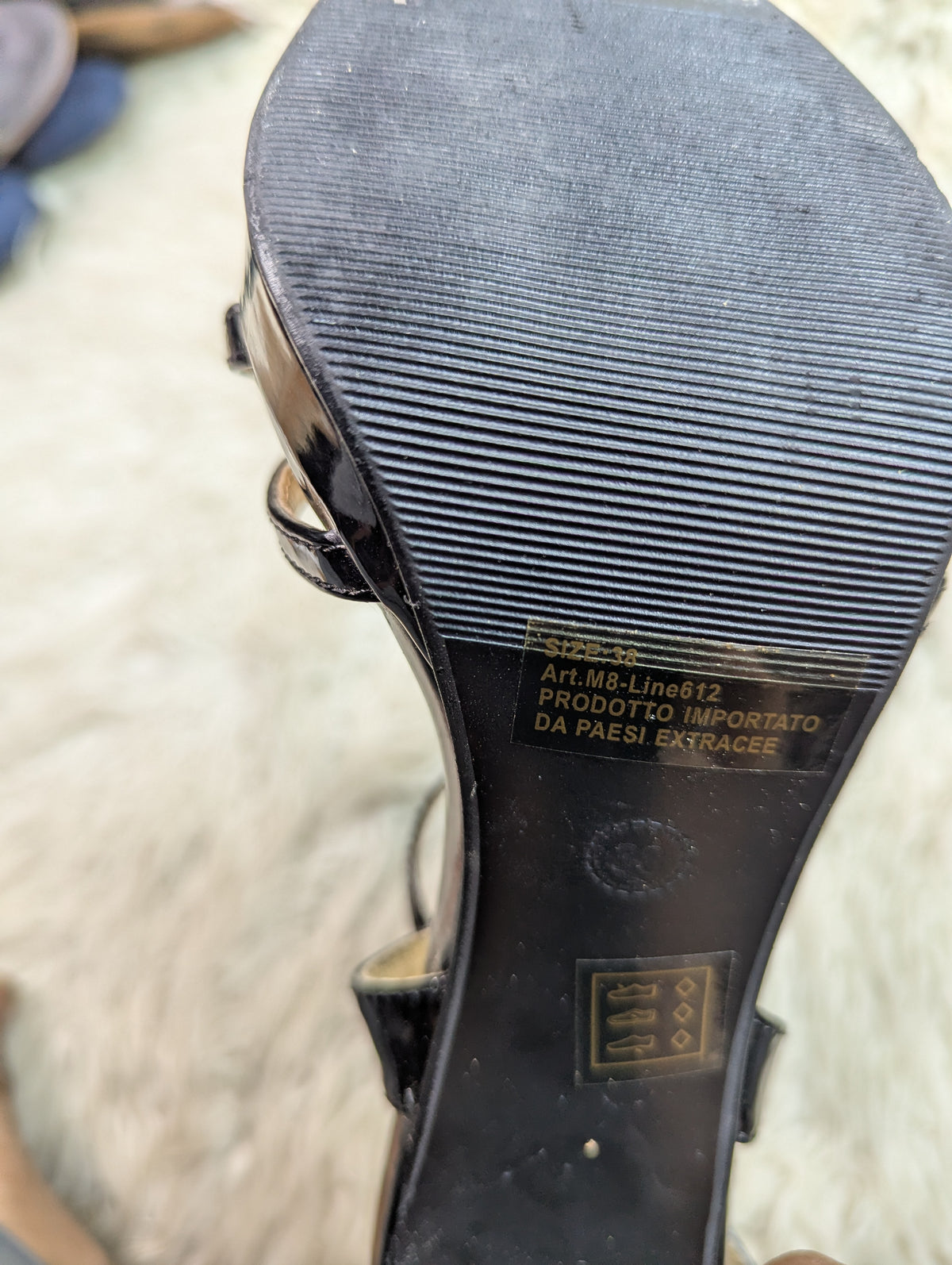 C.H. Creation golden black heel