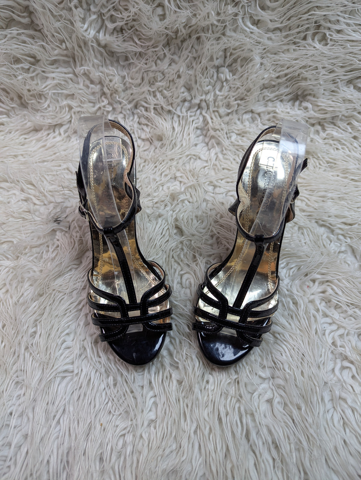 C.H. Creation golden black heel