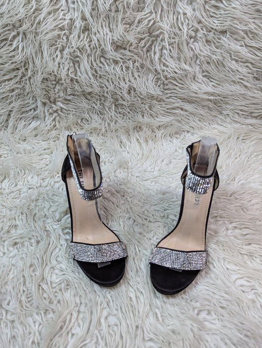 The first Black pencil heel