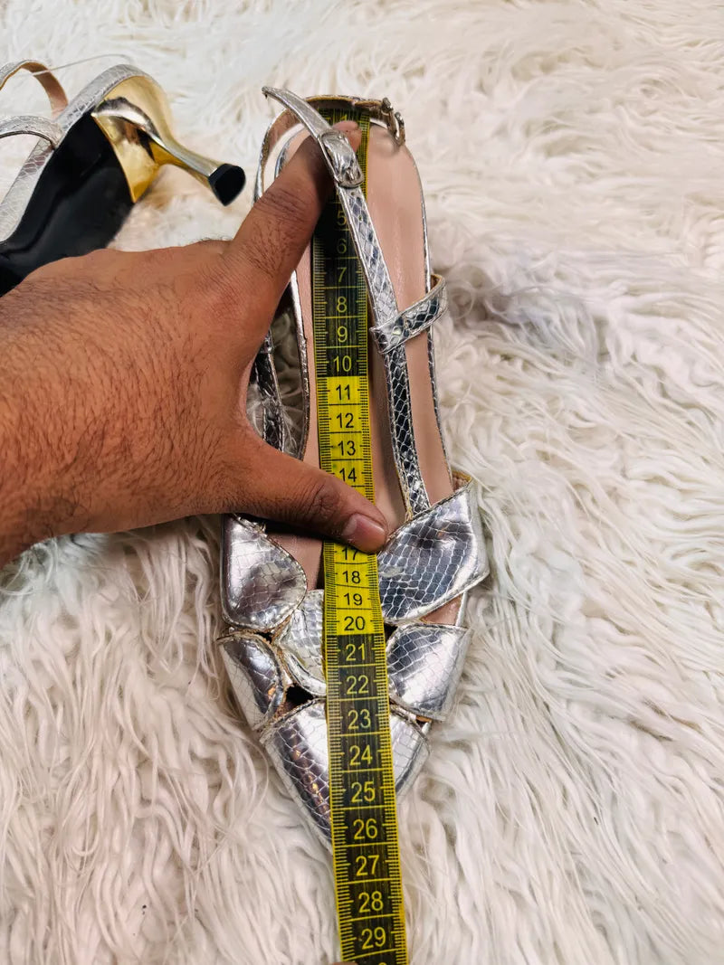 Silver pencil heel pump style